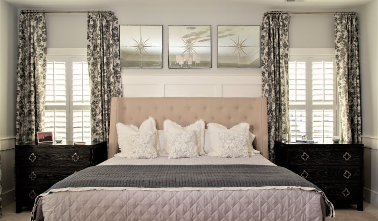 Plantation shutters in a bedroom.